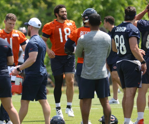 Chicago Bears quarterback Caleb Williams (18) works out Thursday, May 23, 2024, during OTAs at Halas Hall. (Brian Cassella/Chicago Tribune)