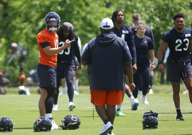 Chicago Bears quarterback Caleb Williams (18) works out Thursday, May 23, 2024, during OTAs at Halas Hall. (Brian Cassella/Chicago Tribune)