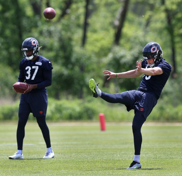 Chicago Bears punter Tory Taylor (19) follows through on a punt during Organized Team Activities at Halas Hall in Lake Forest on Friday, May 31, 2024. (Chris Sweda/Chicago Tribune)