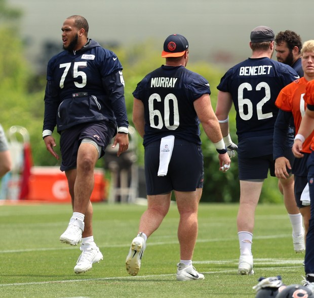 Chicago Bears offensive tackle Larry Borom (75), guard Bill Murray (60), and offensive tackle Theo Benedet (62) during minicamp today at Halas Hall on June 4, 2024, in Lake Forest. (Stacey Wescott/Chicago Tribune)