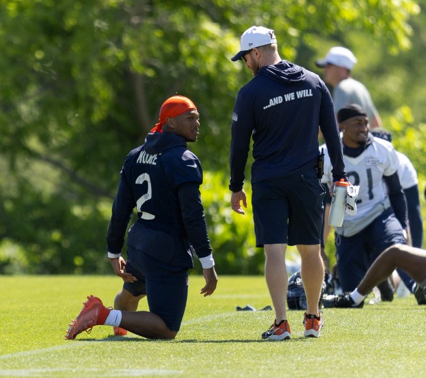 Chicago Bears wide receiver DJ Moore (2) stretches during Bears minicamp at Halas Hall on June 6, 2024, in Lake Forest (Stacey Wescott/Chicago Tribune)