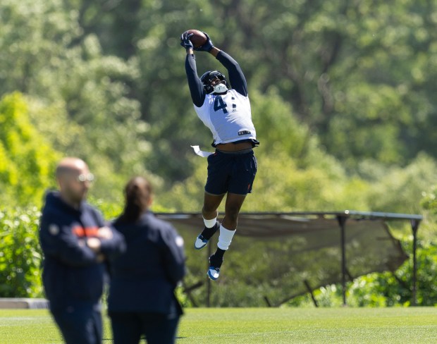 Chicago Bears linebacker Micah Baskerville (47) snags a pass during Bears minicamp at Halas Hall on June 6, 2024, in Lake Forest (Stacey Wescott/Chicago Tribune)