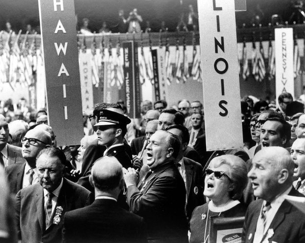 Incensed over criticism of his police, Mayor Richard J. Daley shouts at the lectern at the Democratic Convention on Aug. 28, 1968. Tumult inside the Amphitheatre and violence in Grant Park put the nation's leading convention city off limits for political parties for nearly 30 years. (Val Mazzanga/Chicago Tribune)