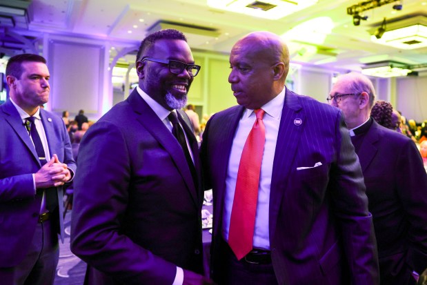 Chicago Bears President and CEO Kevin Warren, right, speaks with Mayor Brandon Johnson during a Chicagoland Chamber of Commerce meeting at the Hilton in the Loop on June 4, 2024. (Eileen T. Meslar/Chicago Tribune)