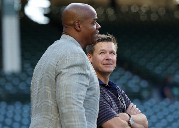 Former White Sox player Frank Thomas, left, and general manager Chris Getz talk before a game against the Cubs at Wrigley Field on June 5, 2024, in Chicago. (John J. Kim/Chicago Tribune)