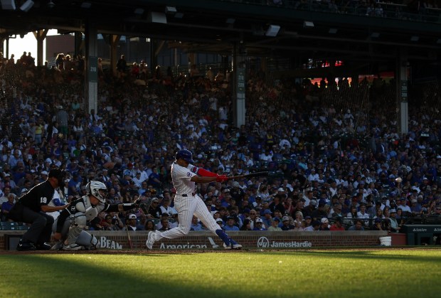 Cubs third baseman Christopher Morel (5) connects for a single against the White Sox in the second inning at Wrigley Field on June 5, 2024, in Chicago. (John J. Kim/Chicago Tribune)