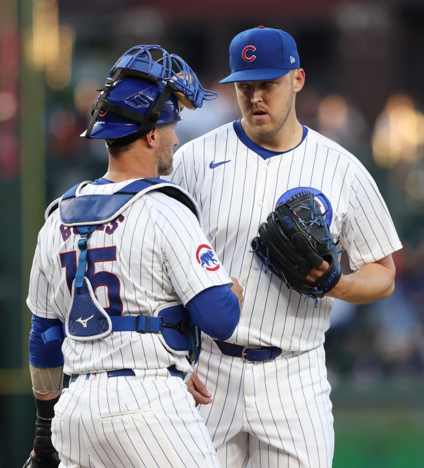 Cubs pitcher Jameson Taillon, right, listens to catcher Yan Gomes (15) in the fourth inning against the White Sox at Wrigley Field on June 5, 2024, in Chicago. (John J. Kim/Chicago Tribune)