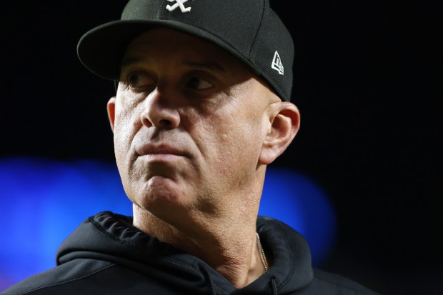 White Sox manager Pedro Grifol heads to the dugout after making his second pitching change of the the seventh inning against the Cubs at Wrigley Field on June 5, 2024, in Chicago. (John J. Kim/Chicago Tribune)