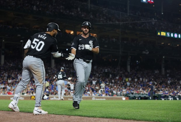 White Sox shortstop Paul DeJong (29) heads to the dugout after hitting a home run to tie the game at 6-6 in the eighth inning against the Cubs at Wrigley Field on June 5, 2024, in Chicago. (John J. Kim/Chicago Tribune)