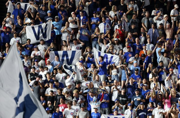 Cubs fans celebrate a 7-6 Cubs win over the White Sox at Wrigley Field on June 5, 2024, in Chicago. (John J. Kim/Chicago Tribune)