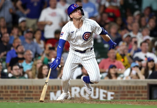 Chicago Cubs second baseman Nico Hoerner (2) drives in the game-winning walk off infield single in the 10th inning of a game against the Atlanta Braves at Wrigley Field in Chicago on May 21, 2024. (Chris Sweda/Chicago Tribune)