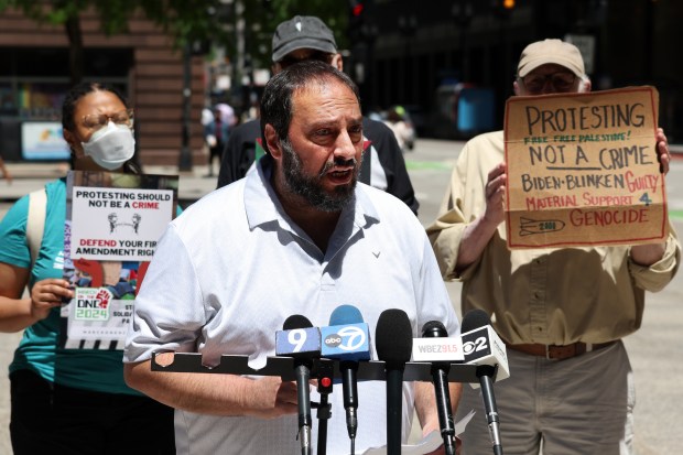 Hatem Abudayyeh, U.S. Palestinian Community Network National Chairman, holds a press conference outside the Dirksen U.S. Courthouse in Chicago on June 6, 2024, after a status hearing in federal court concerning the fight for a permit to march within sight and sound of the Democratic National Convention. (Terrence Antonio James/Chicago Tribune)