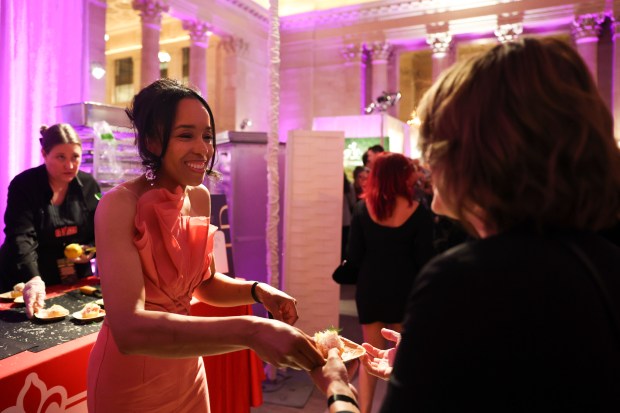 Maya-Camille Broussard, of Justice of the Pies, hands out Shokupan Lobster Rolls at the James Beard Foundation Awards afterparty at Union Station on June 10, 2024. (Eileen T. Meslar/Chicago Tribune)