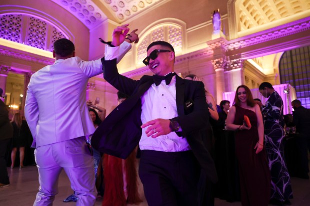 Atushi Kono, right, nominee for Best Chef New York, dances with Timmy Pyles, of Moon Rabbit DC, at the James Beard Foundation Awards afterparty at Union Station on June 10, 2024. (Eileen T. Meslar/Chicago Tribune)