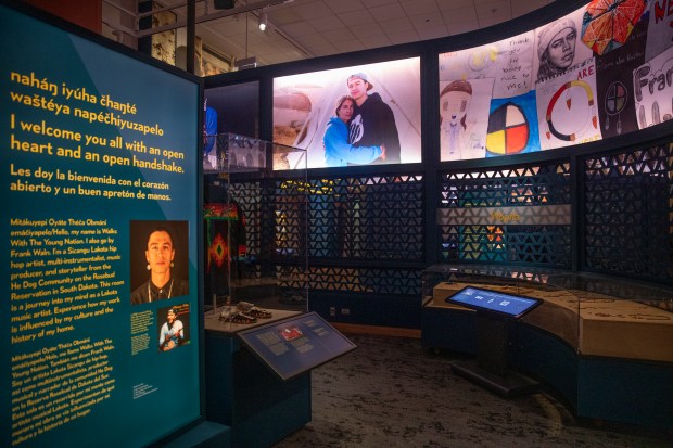 An exhibit where one can hear Frank Waln, a Sicangu Lakota hip-hop artist, is part of the Field Museum's "Native Truths: Our Voices, Our Stories" permanent exhibit, shown May 24, 2022. (Erin Hooley/Chicago Tribune)