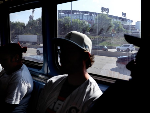 Guaranteed Rate Field is seen out of the windows as baseball fans ride a CTA Red Line train from Addison to 35th Street while attending both Chicago Cubs and White Sox home games on May 23, 2024. (Chris Sweda/Chicago Tribune)