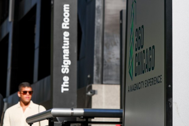 Signage for 360 CHICAGO and the Signature Room outside the 875 North Michigan Avenue building on May 30, 2024. (Eileen T. Meslar/Chicago Tribune)