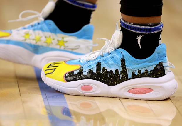 Chicago Sky forward Angel Reese (5) wears shoes featuring the Chicago skyline during the team's home opener against the Connecticut Sun at Wintrust Arena in Chicago on May 25, 2024. (Chris Sweda/Chicago Tribune)