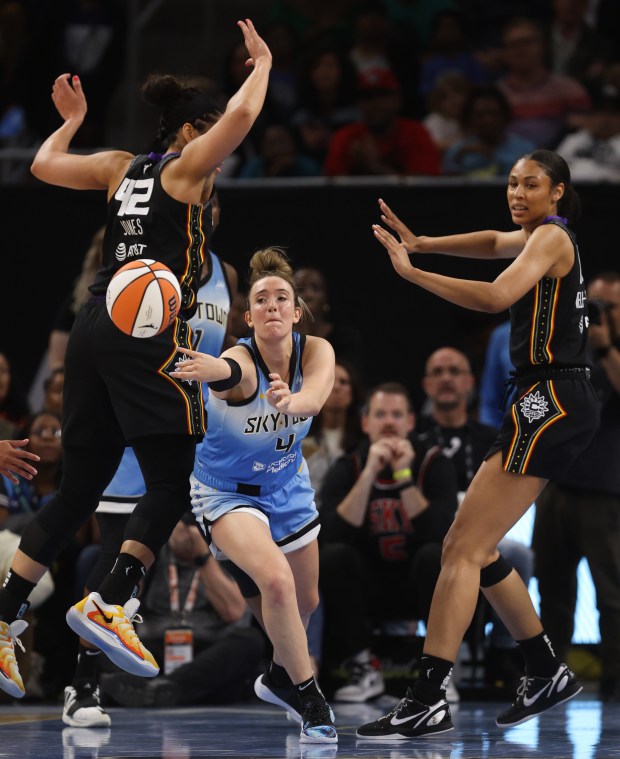 Chicago Sky guard Marina Mabrey (4) passes out to a teammate in the second half of the Sky's home opener against the Connecticut Sun at Wintrust Arena in Chicago on May 25, 2024. (Chris Sweda/Chicago Tribune)