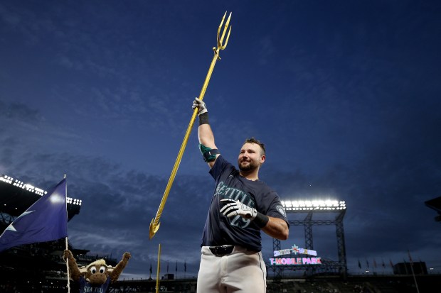 Cal Raleigh of the Mariners celebrates his walk-off grand slam to beat the White Sox at T-Mobile Park on June 10, 2024, in Seattle. (Steph Chambers/Getty Images)