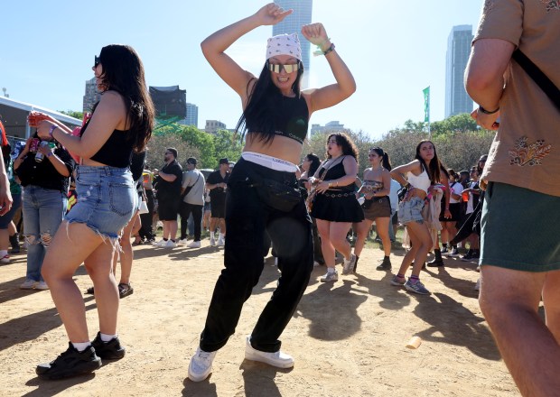 Celezte Degollado, of Seattle, dances during the Sueños Music Festival at Grant Park on May 25, 2024, in Chicago. (John J. Kim/Chicago Tribune)