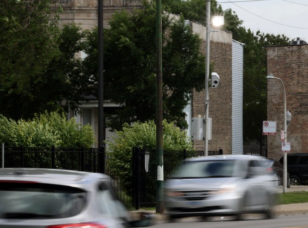 A speed camera light flashes above a vehicle in the 1100 block of South Pulaski Avenue, June 6, 2024, in Chicago. (John J. Kim/Chicago Tribune)