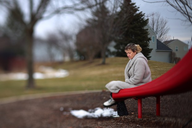 Lisa Eller, shown in January at a park near her Yorkville home, said she now has trouble trusting doctors, interfering with her care for advanced emphysema. (Stacey Wescott/Chicago Tribune)