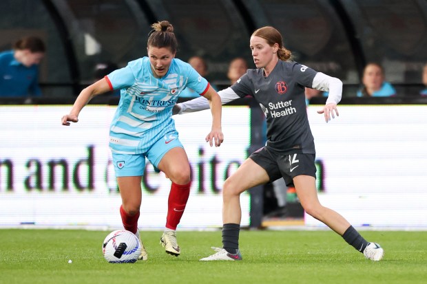 Chicago Red Stars defender Natalia Kuikka (12) battles Bay FC Tess Boade for the ball during their game at Wrigley Field on June 8, 2024. (Eileen T. Meslar/Chicago Tribune)