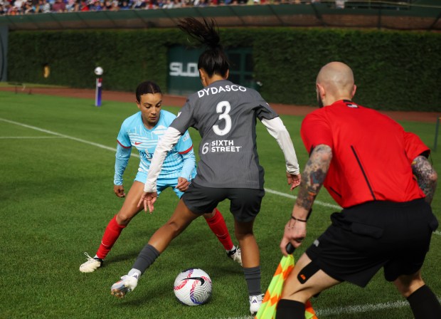 Chicago Red Stars forward Mallory Swanson (9) defends Bay FC's Caprice Dydasco during their game at Wrigley Field on June 8, 2024. (Eileen T. Meslar/Chicago Tribune)