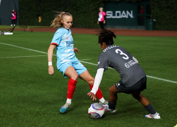 Chicago Red Stars forward Penelope Hocking (55) defends Bay FC's Caprice Dydasco during their game at Wrigley Field on June 8, 2024. (Eileen T. Meslar/Chicago Tribune)