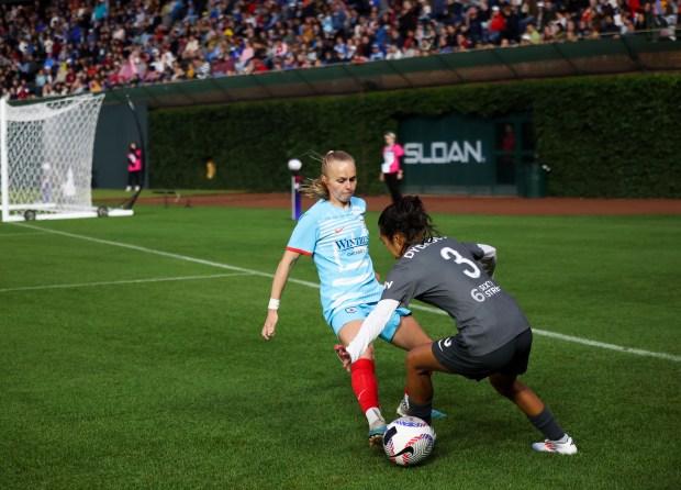 Chicago Red Stars forward Penelope Hocking (55) defends Bay FC's Caprice Dydasco during their game at Wrigley Field on June 8, 2024. (Eileen T. Meslar/Chicago Tribune)