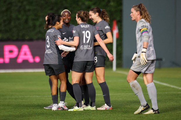 Bay FC players celebrate their goal during their game against the Chicago Red Stars at Wrigley Field on June 8, 2024. (Eileen T. Meslar/Chicago Tribune)