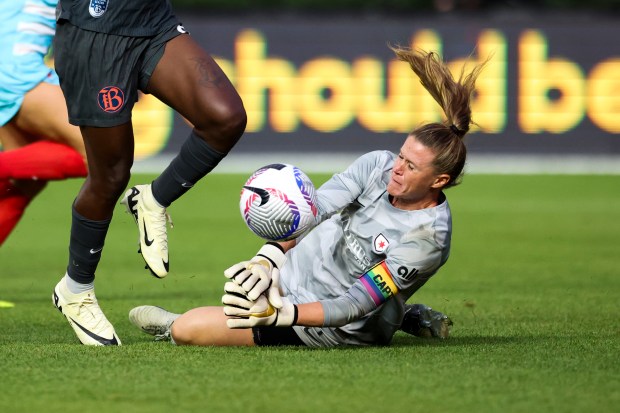 Chicago Red Stars goalkeeper Alyssa Naeher (1) tries to stop Bay FC's Racheal Kundananji during their game at Wrigley Field on June 8, 2024. (Eileen T. Meslar/Chicago Tribune)