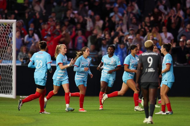 Chicago Red Stars players celebrate forward Penelope Hocking's goal during their game against Bay FC at Wrigley Field on June 8, 2024. (Eileen T. Meslar/Chicago Tribune)