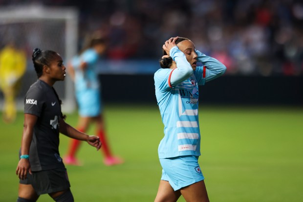 Chicago Red Stars forward Mallory Swanson (9) holds her head after losing to Bay FC at Wrigley Field on June 8, 2024. (Eileen T. Meslar/Chicago Tribune)