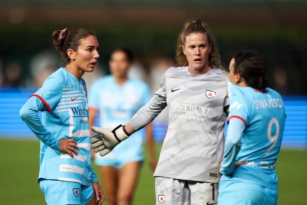 Chicago Red Stars goalkeeper Alyssa Naeher (1) speaks to defender Tatumn Milazzo (23) and forward Mallory Swanson (9) after losing to Bay FC at Wrigley Field on June 8, 2024. (Eileen T. Meslar/Chicago Tribune)