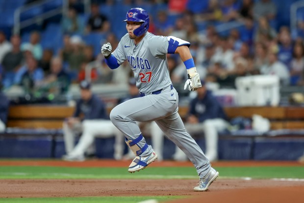 Seiya Suzuki #27 of the Chicago Cubs runs for a double against the Tampa Bay Rays during the first inning of a baseball game at Tropicana Field on June 12, 2024 in St. Petersburg, Florida. (Photo by Mike Carlson/Getty Images)