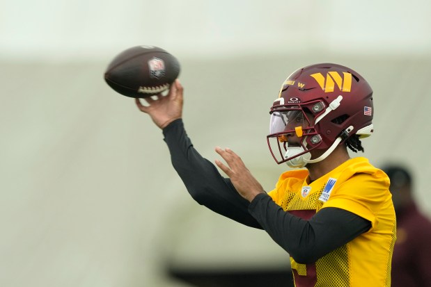 Commanders quarterback Jayden Daniels throws the ball during rookie minicamp in Ashburn, Va., on May 10, 2024. (AP Photo/Susan Walsh)