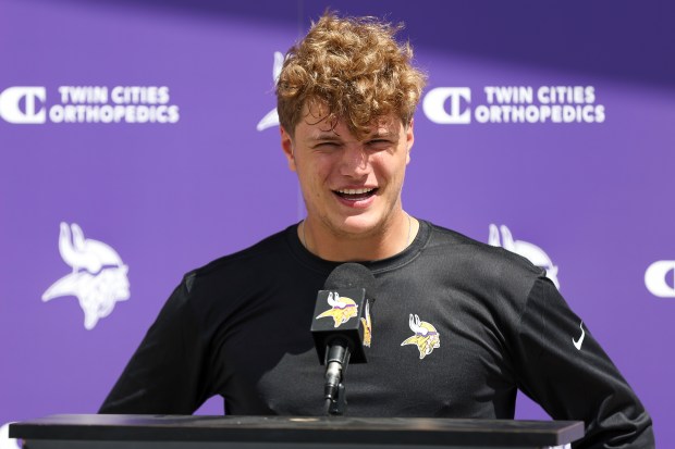 Minnesota Vikings quarterback J.J. McCarthy speaks to the media during the NFL football team's rookie minicamp in Eagan, Minn, Friday, May 10, 2024. (AP Photo/Matt Krohn)