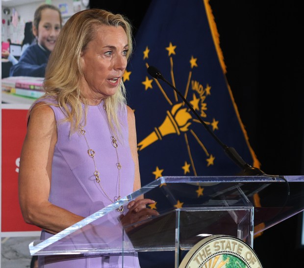 Beth White, Trustee with the Dean and Barbara White Family Foundation speaks to the crowd during a ceremony where The Dean and Barbara White Family Foundation, Big Shoulders Fund, and the Diocese of Gary is making a $150 million investment over ten years to sustain Catholic schools in Northwest Indiana on Wednesday, June 12, 2024. (John Smierciak/Post Tribune)