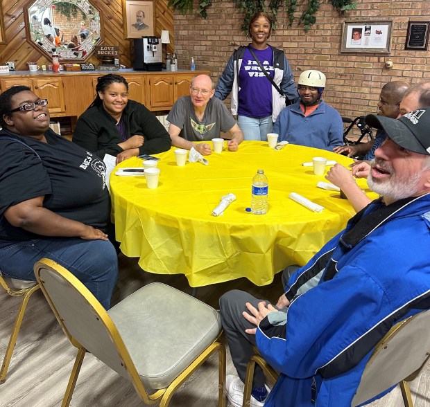 Participants and staff from St. Coletta's of Illinois enjoy a picnic lunch on June 5 at All Saints Lutheran Church in Orland Park. (St. Coletta's of Illinois)